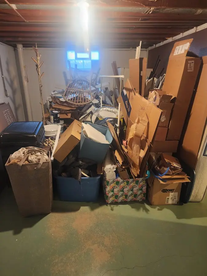 Roll-off dumpster container at job site for 2 Yard Dumpster Rental in Burkburnett